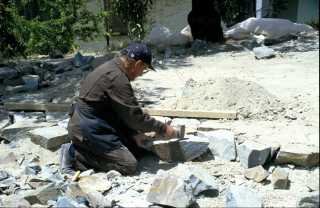 Kyperounta, the garden of the Museum of the Holy Cross. Work during the laying of the stone path, 1994.